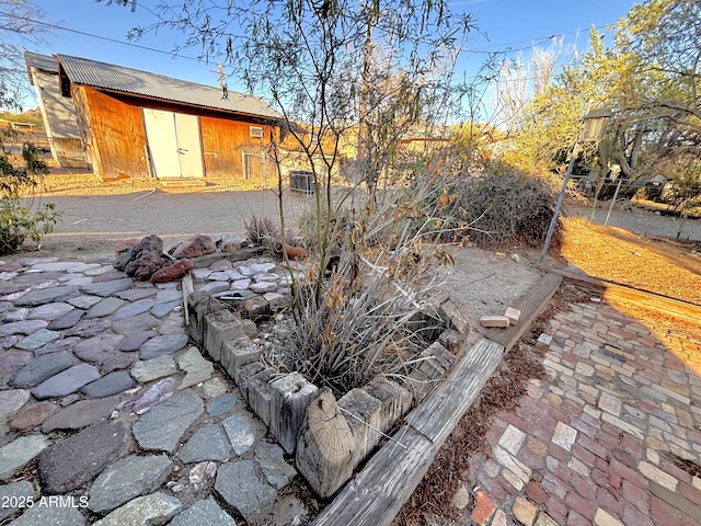 1025 N Sartillion Ave, Ajo, AZ 85321 - view of patio with an outbuilding