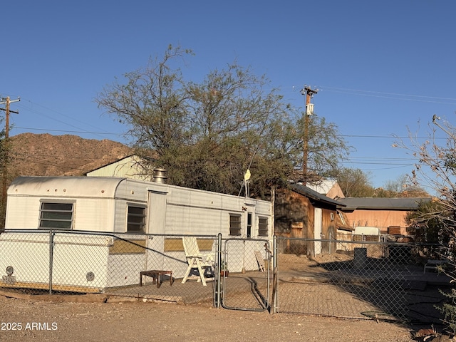 1025 N Sartillion Ave, Ajo, AZ 85321 - view of front of home with a gate
