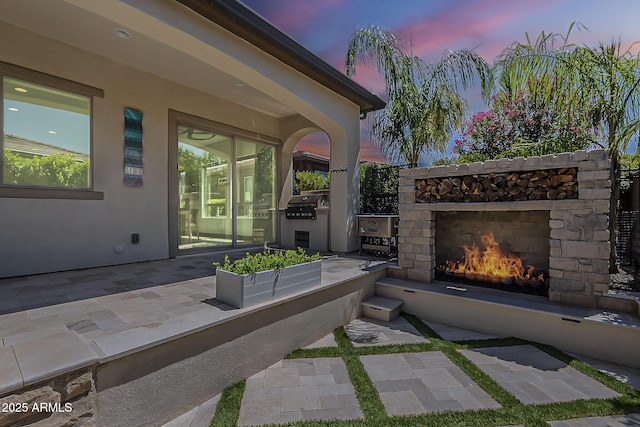 199 E Tangerine Path, Queen Creek, AZ 85140 - view of patio / terrace with an outdoor stone fireplace