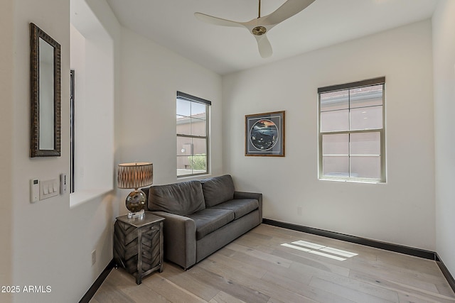 199 E Tangerine Path, Queen Creek, AZ 85140 - living area featuring plenty of natural light and light wood-style flooring