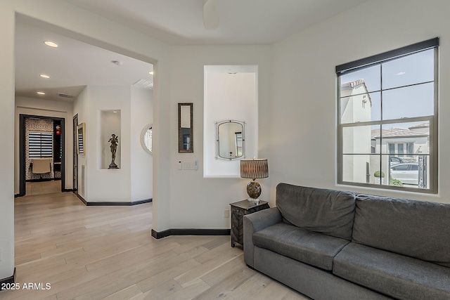199 E Tangerine Path, Queen Creek, AZ 85140 - living area featuring light wood-type flooring and recessed lighting