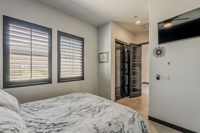 199 E Tangerine Path, Queen Creek, AZ 85140 - bedroom featuring wood finished floors, a closet, and recessed lighting