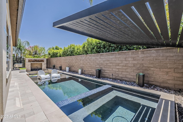 199 E Tangerine Path, Queen Creek, AZ 85140 - view of swimming pool featuring an in-ground hot tub, a fenced backyard, and a patio area