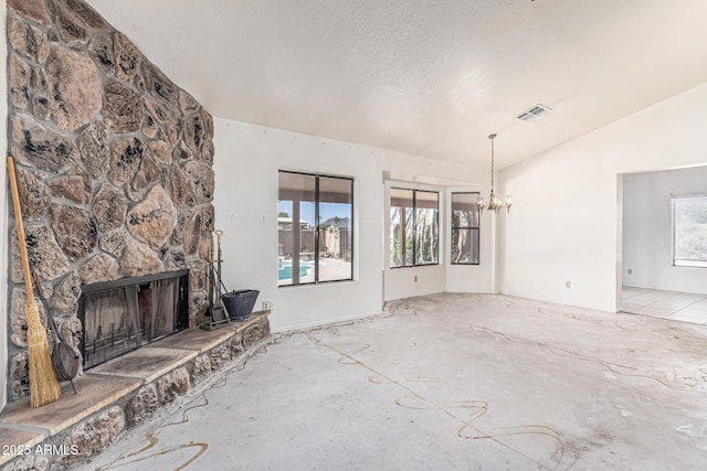 6032 W Grovers Ave, Glendale, AZ 85308 - unfurnished living room featuring vaulted ceiling, plenty of natural light, a chandelier, and a stone fireplace