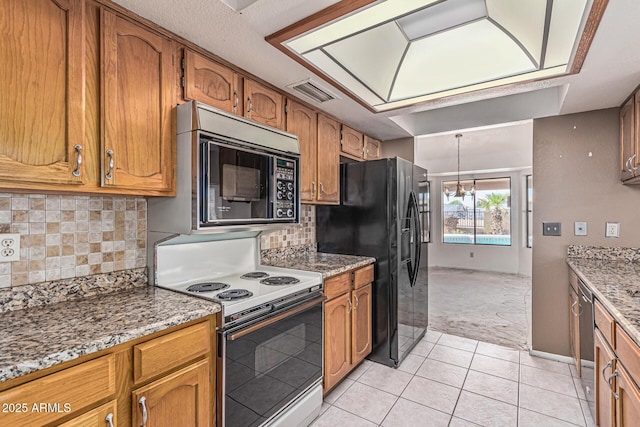 6032 W Grovers Ave, Glendale, AZ 85308 - kitchen with black appliances, light colored carpet, brown cabinets, a chandelier, and light stone countertops