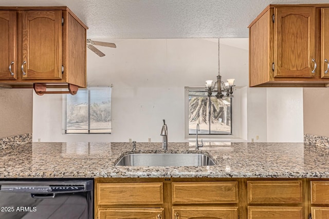 6032 W Grovers Ave, Glendale, AZ 85308 - kitchen featuring a sink, dishwasher, a ceiling fan, a chandelier, and a textured ceiling