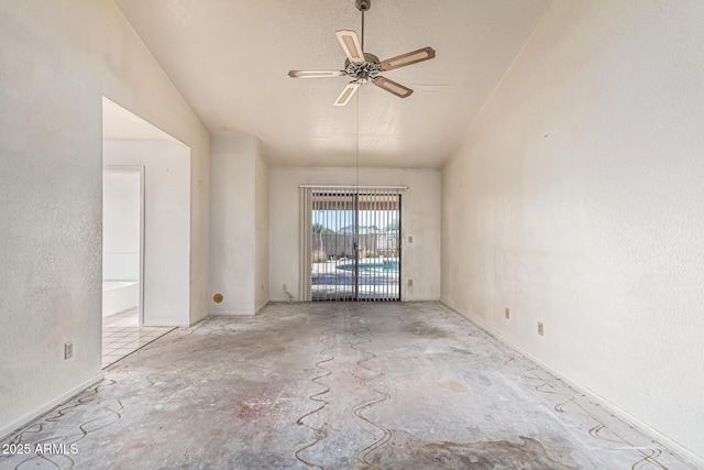 6032 W Grovers Ave, Glendale, AZ 85308 - spare room with concrete floors, vaulted ceiling, and a ceiling fan