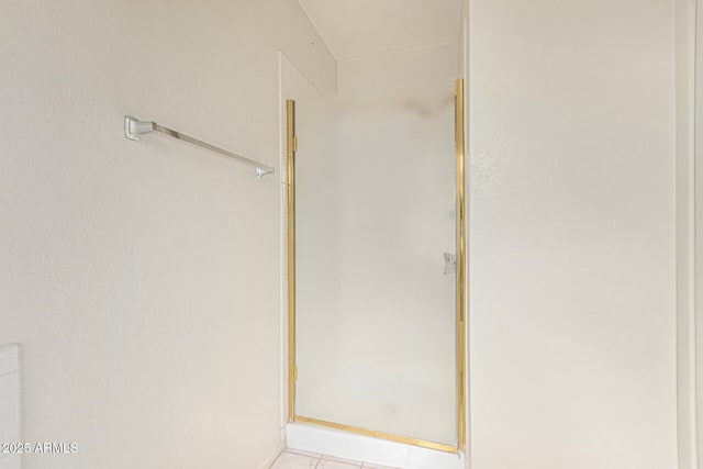 6032 W Grovers Ave, Glendale, AZ 85308 - bathroom featuring a shower stall and tile patterned floors