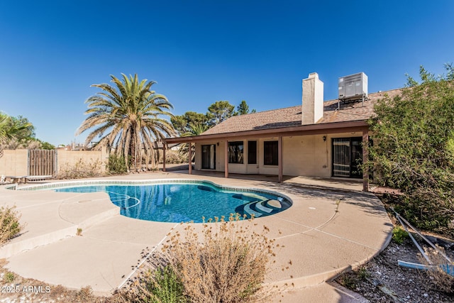 6032 W Grovers Ave, Glendale, AZ 85308 - view of pool with a patio and central air condition unit