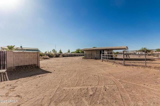 6032 W Grovers Ave, Glendale, AZ 85308 - view of yard featuring an exterior structure and an outdoor structure
