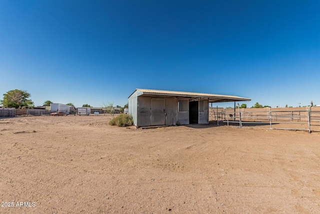6032 W Grovers Ave, Glendale, AZ 85308 - rear view of property featuring an exterior structure and an outbuilding