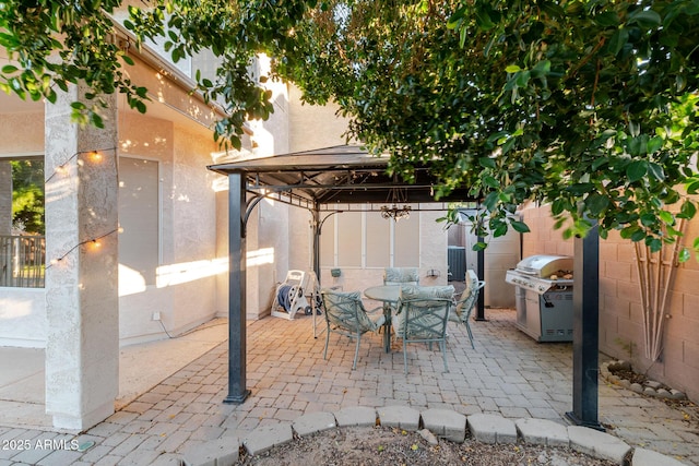 288 W Los Alamos St, Gilbert, AZ 85233 - view of patio / terrace with a gazebo, area for grilling, outdoor dining space, and fence