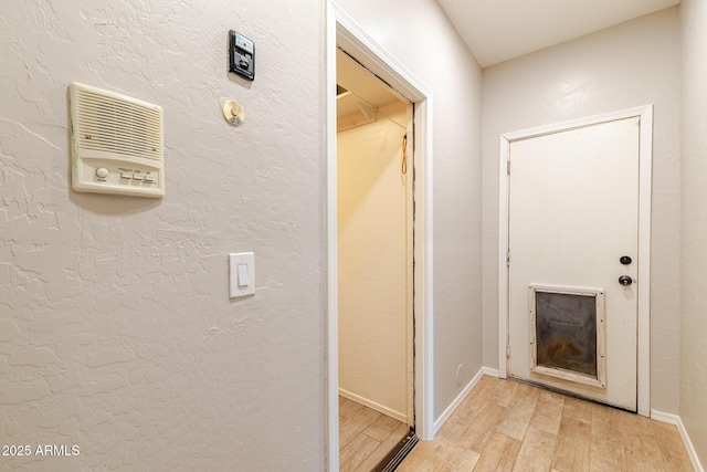 288 W Los Alamos St, Gilbert, AZ 85233 - corridor featuring light wood finished floors and baseboards