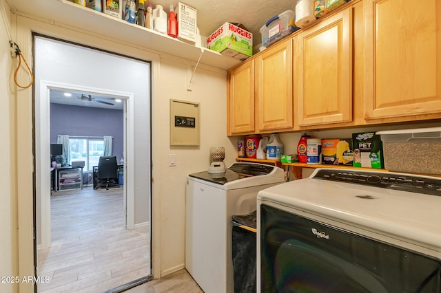 288 W Los Alamos St, Gilbert, AZ 85233 - clothes washing area featuring washer and dryer, light wood-type flooring, cabinet space, a desk, and baseboards