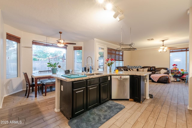 288 W Los Alamos St, Gilbert, AZ 85233 - kitchen with stainless steel dishwasher, ceiling fan, a sink, and light wood finished floors