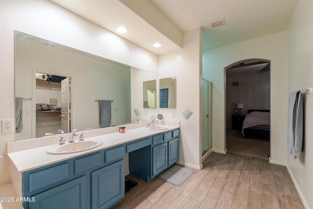288 W Los Alamos St, Gilbert, AZ 85233 - full bath with ensuite bath, double vanity, wood finished floors, a stall shower, and recessed lighting