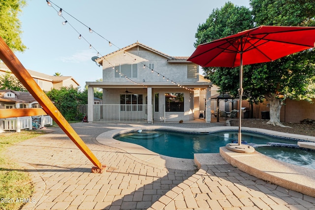 288 W Los Alamos St, Gilbert, AZ 85233 - view of swimming pool featuring a patio area, a fenced backyard, and a pool with connected hot tub