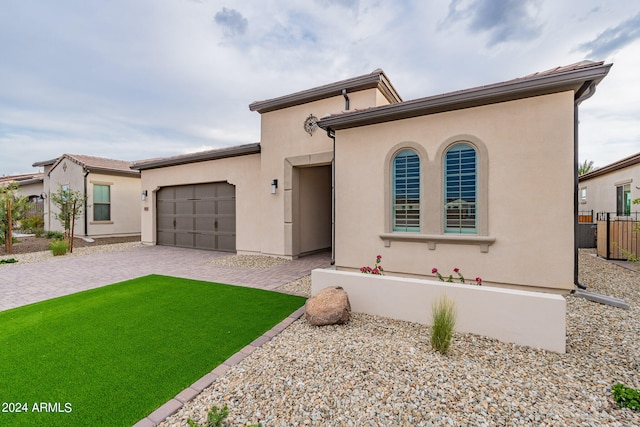 view of front of home with a garage