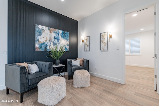 living area featuring light hardwood / wood-style floors