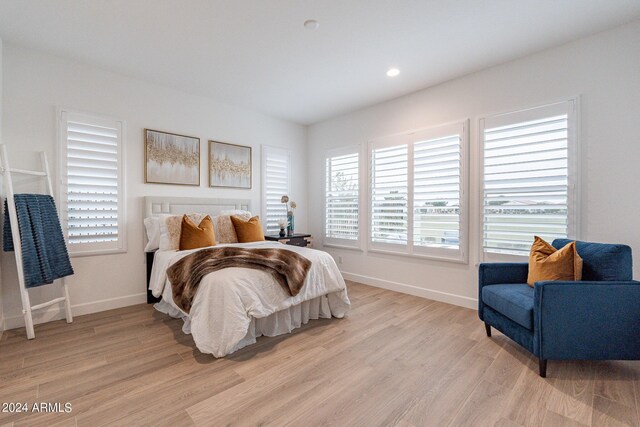 sitting room featuring light hardwood / wood-style flooring