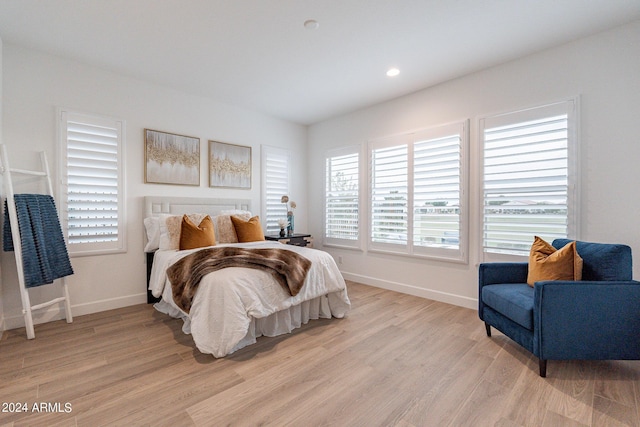 bedroom with light wood-type flooring