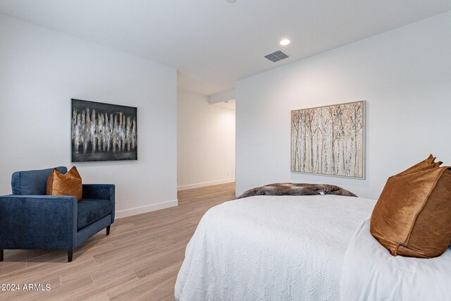 bedroom featuring light wood-type flooring