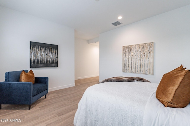 bedroom featuring light hardwood / wood-style floors