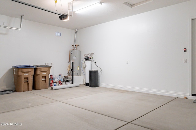 garage featuring a garage door opener and water heater