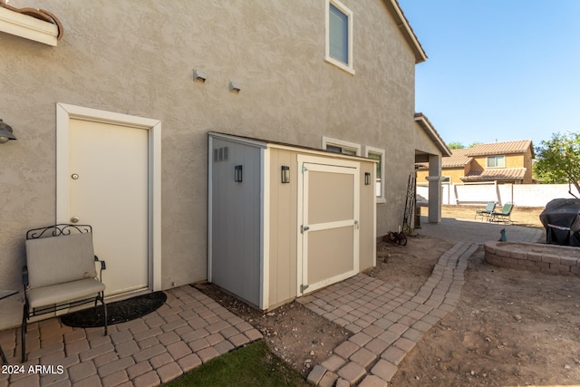 entrance to property featuring a patio