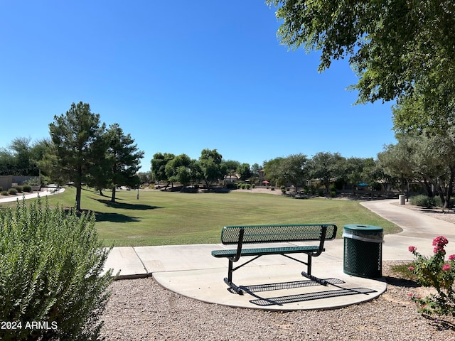 view of home's community featuring a lawn