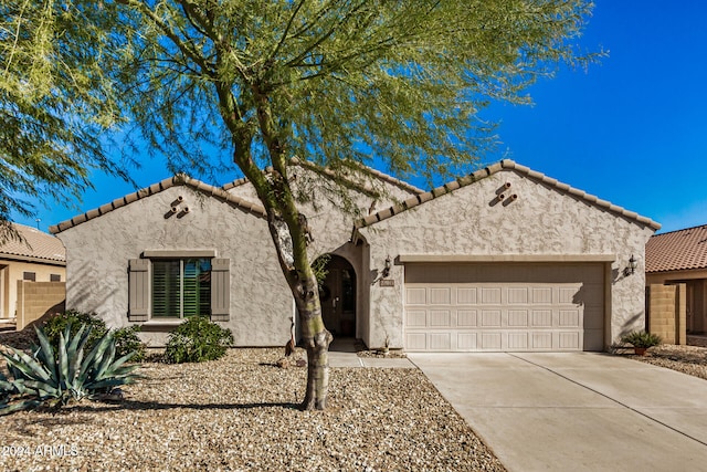 view of front of home with a garage