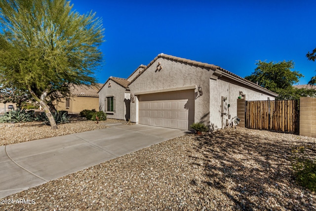 view of front of property with a garage