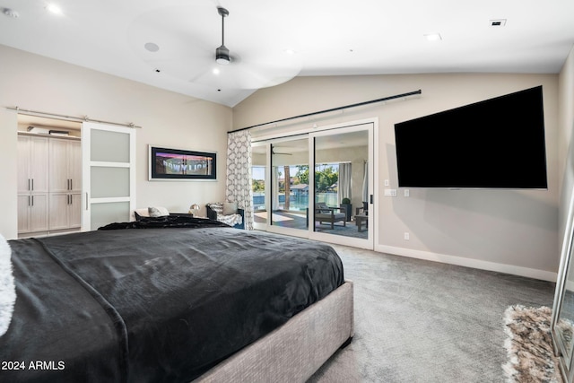 carpeted bedroom featuring a barn door, access to outside, ceiling fan, and lofted ceiling