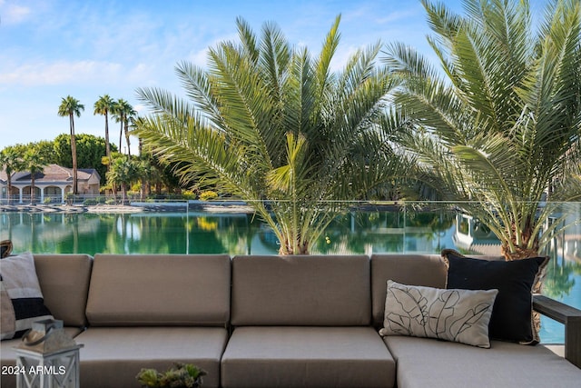 balcony featuring a water view