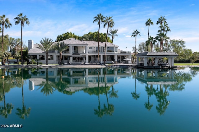 view of swimming pool featuring a water view