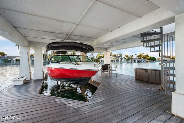 dock area with a water view