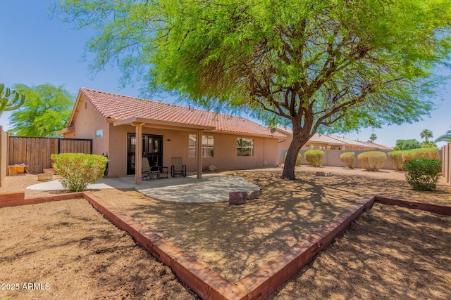 1492 E Westchester Dr, Chandler, AZ 85249 - rear view of property with a tiled roof, stucco siding, a fenced backyard, and a patio