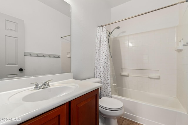 full bathroom with vanity, shower / tub combo with curtain, and toilet