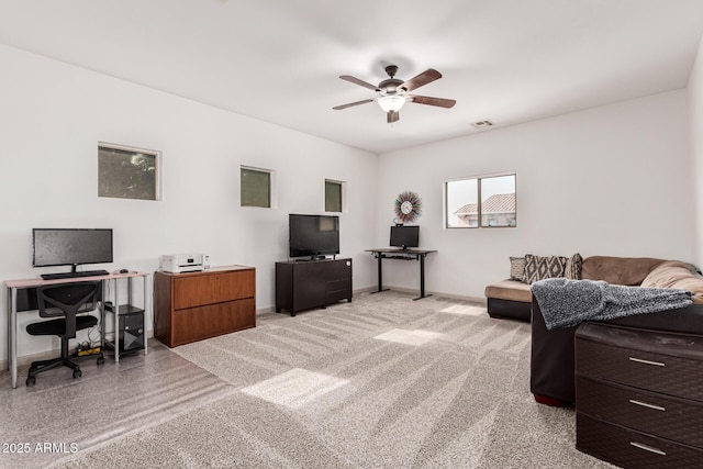 interior space featuring ceiling fan