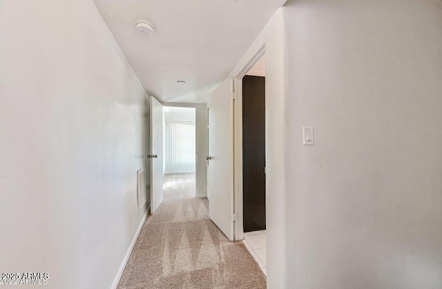 3949 E Earll Dr, Phoenix, AZ 85018 - hall featuring light colored carpet and baseboards