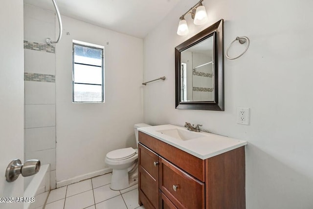 3949 E Earll Dr, Phoenix, AZ 85018 - full bathroom with vanity, toilet, tile patterned floors, and baseboards