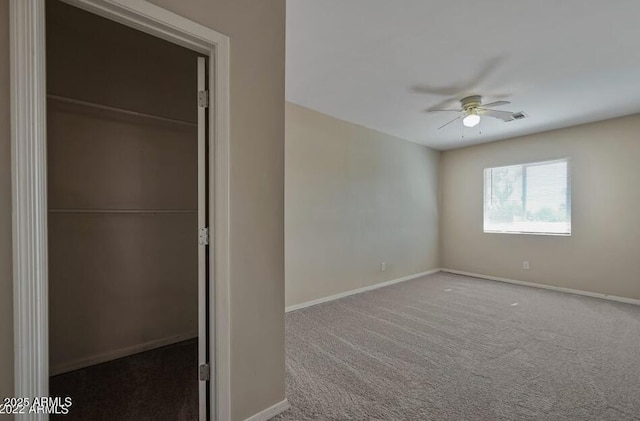 3949 E Earll Dr, Phoenix, AZ 85018 - unfurnished bedroom with baseboards, a closet, carpet, and ceiling fan