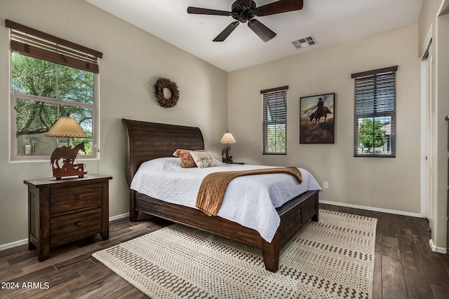 bedroom featuring ceiling fan and dark hardwood / wood-style floors