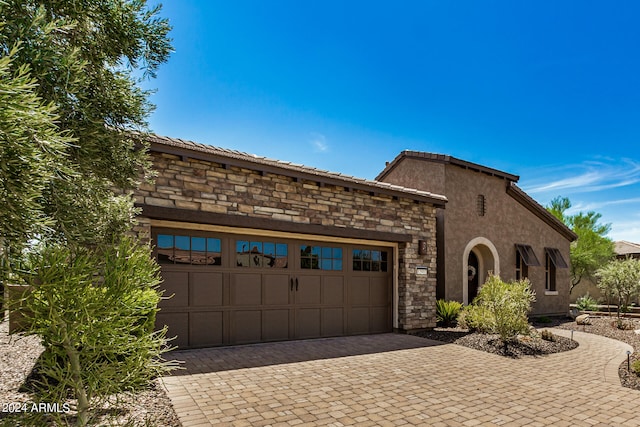 view of front of home featuring a garage