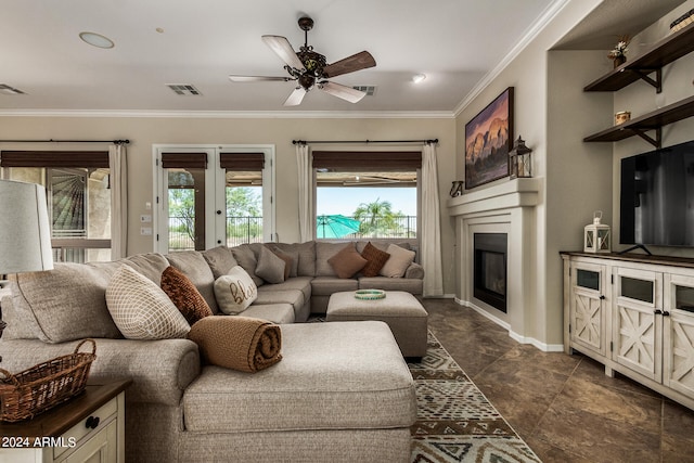 living room with french doors, ceiling fan, and crown molding