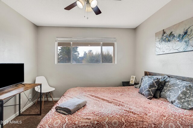 7520 E Papago Dr, Scottsdale, AZ 85257 - bedroom with carpet floors, baseboards, and ceiling fan