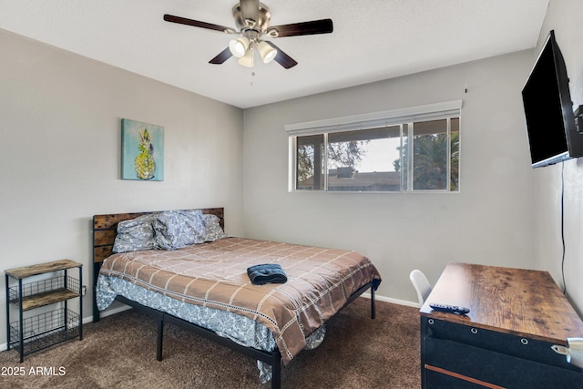7520 E Papago Dr, Scottsdale, AZ 85257 - carpeted bedroom with baseboards and a ceiling fan