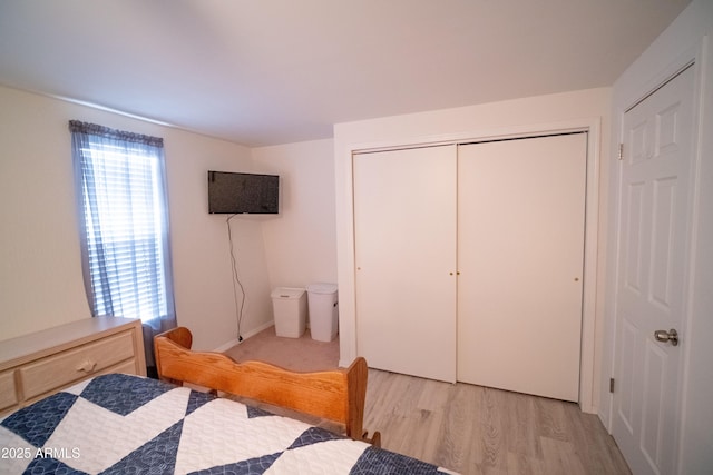 7411 N Toya Vista Rd, Payson, AZ 85541 - bedroom with a closet and light wood finished floors
