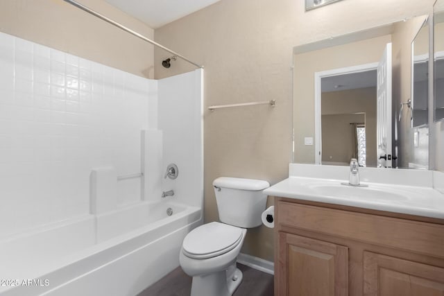 full bathroom featuring toilet, vanity, hardwood / wood-style floors, and shower / bath combination