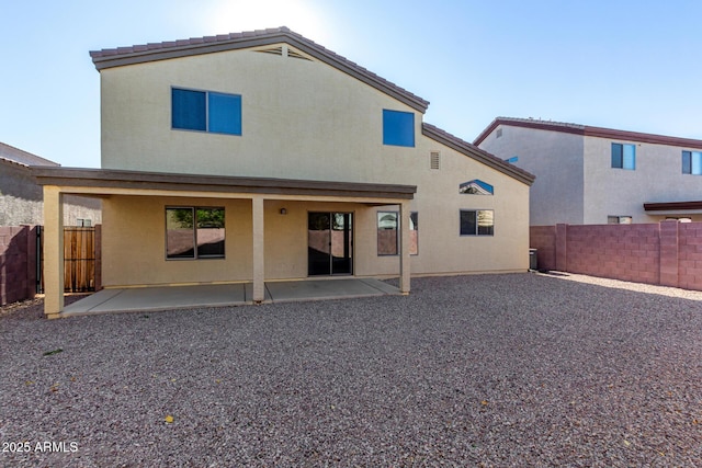 rear view of house with a patio area